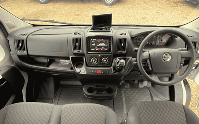 Driver's cab of the CVMinibus with DAB radio and air conditioning