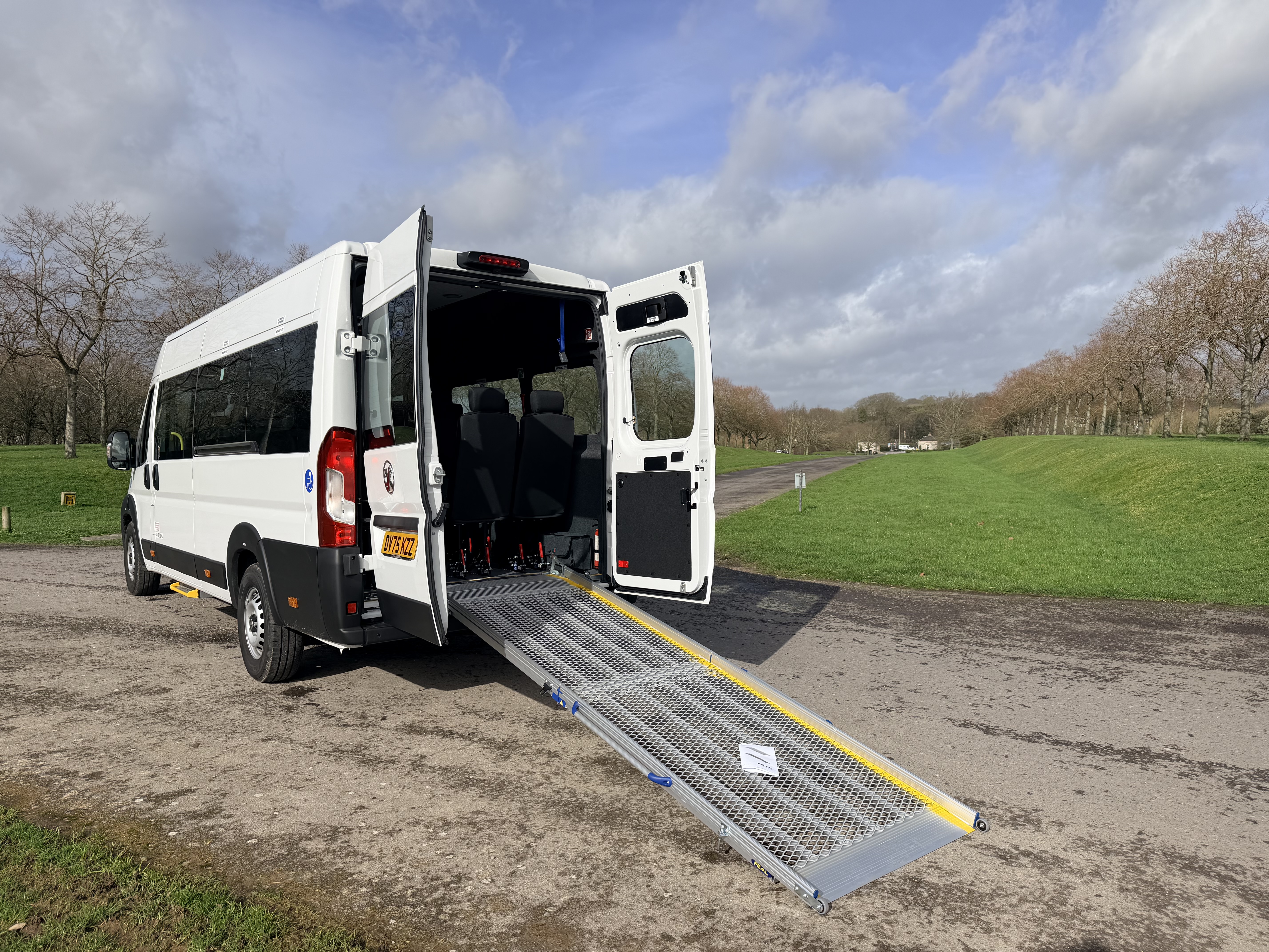 Manual rear ramp deployed on a CVM accessible minibus
