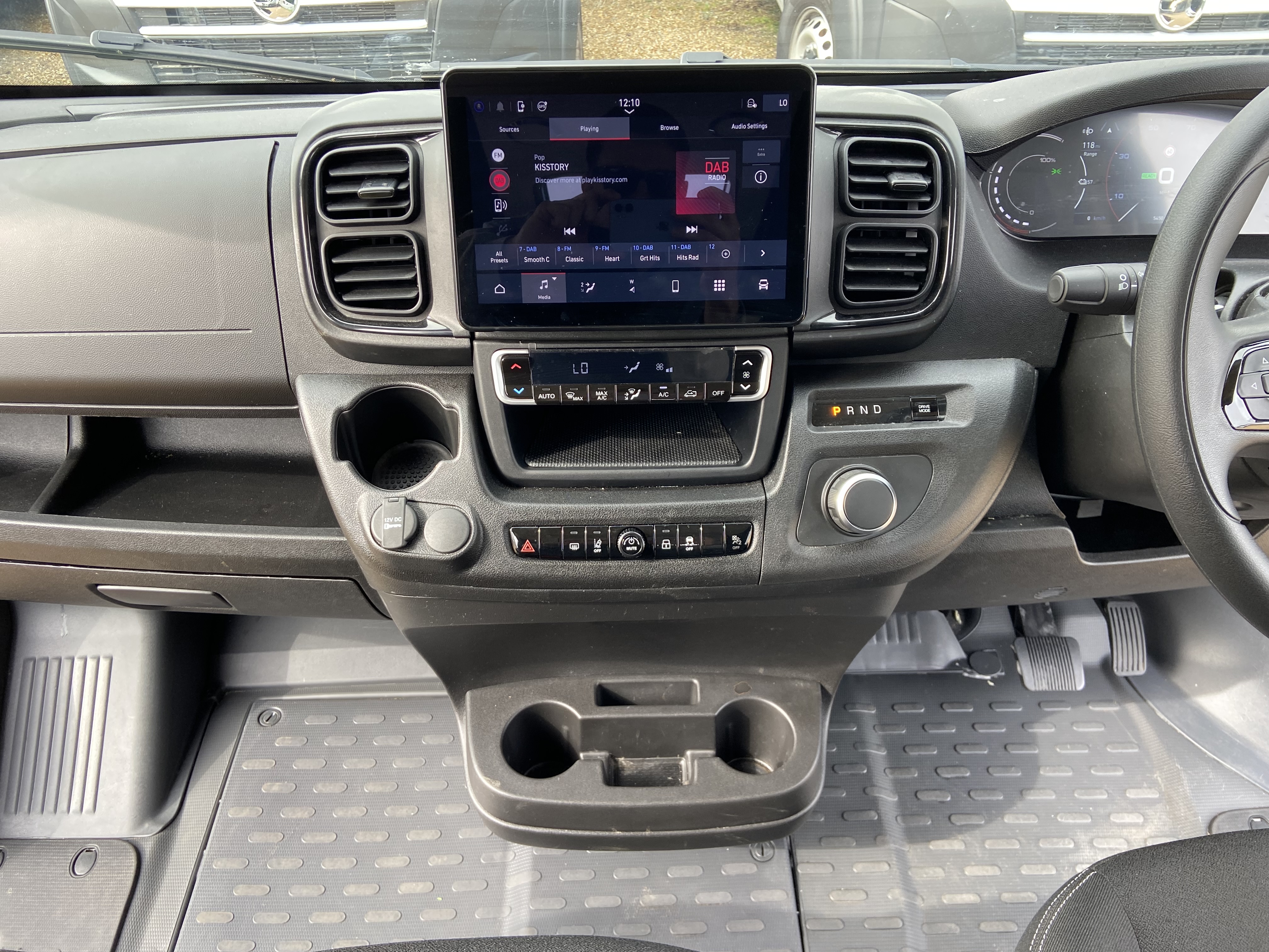 Modern dashboard and touchscreen infotainment in the electric minibus