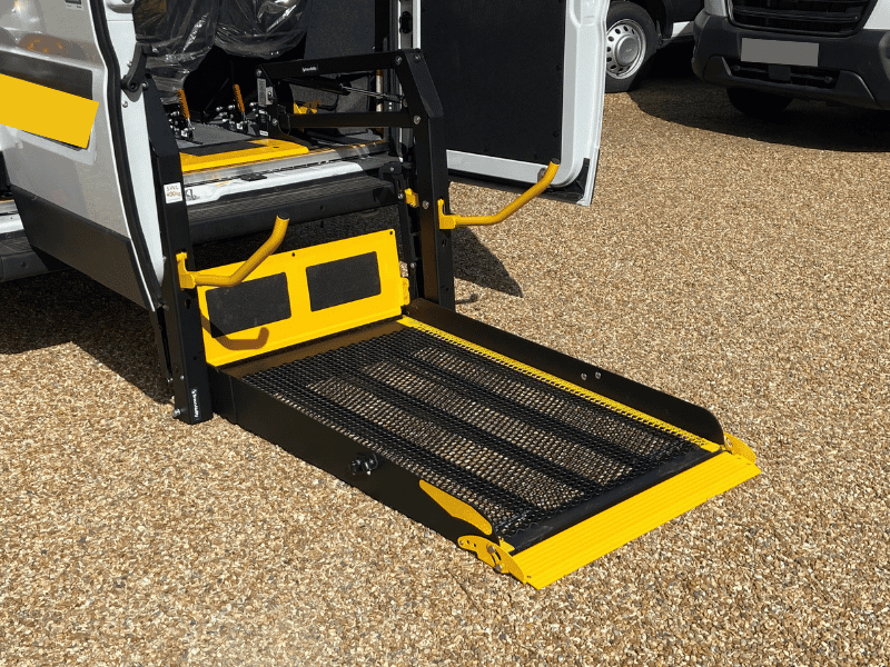 Electro-hydraulic rear tail lift on a CVM accessible minibus