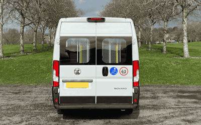 Rear view of the white CVMinibus with glazed rear doors